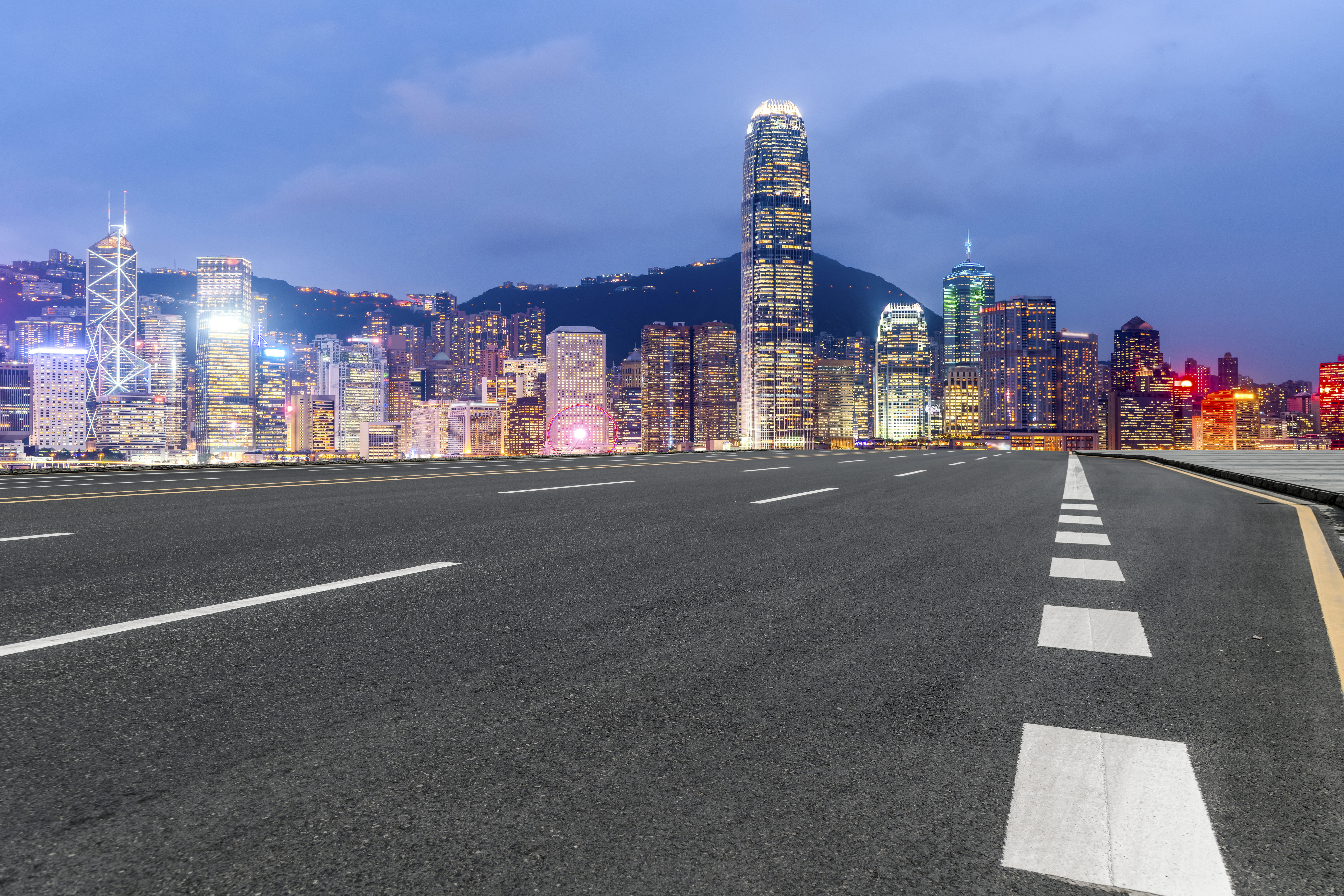 Road surface and urban architectural landscape skyline